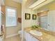 Bathroom with granite countertop and walk-in shower at 5318 88Th E St, Bradenton, FL 34211