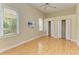Bright bedroom featuring wood floors and double closets at 5318 88Th E St, Bradenton, FL 34211