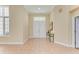 Bright entryway with tile flooring, double doors, and a decorative stained-glass window at 5318 88Th E St, Bradenton, FL 34211