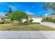 Well maintained lawn, driveway, and landscaping at 5318 88Th E St, Bradenton, FL 34211
