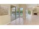 Bright Gathering room with sliding doors leading to the pool and patio area at 5318 88Th E St, Bradenton, FL 34211