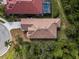 Overhead view of house showcasing roofline and landscaping at 5351 Laurel Oak Ct, North Port, FL 34287