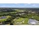 Community overview, showcasing homes, golf course and landscape at 5351 Laurel Oak Ct, North Port, FL 34287