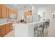 Kitchen with breakfast bar and ample counter space at 5351 Laurel Oak Ct, North Port, FL 34287