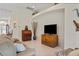 Bright living room featuring a built-in entertainment center and comfortable seating at 5351 Laurel Oak Ct, North Port, FL 34287