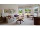 Living room features bay window and antique furniture at 5351 Laurel Oak Ct, North Port, FL 34287