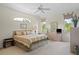 Spacious main bedroom with ample natural light and a large window at 5351 Laurel Oak Ct, North Port, FL 34287