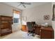 Home office with built-in shelving and ample workspace at 5351 Laurel Oak Ct, North Port, FL 34287