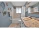 Bathroom with shower/tub, vanity, and ocean decor at 5708 Miami Rd, Venice, FL 34293