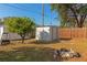 Backyard with shed, fire pit, and fruit tree at 5806 15Th W St, Bradenton, FL 34207