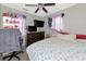 Bright bedroom with a comfortable bed, large TV, and ample closet space at 5806 15Th W St, Bradenton, FL 34207
