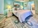 Relaxing bedroom with a king-size bed and coastal decor at 6707 Stone River Rd # 203, Bradenton, FL 34203