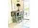 Small breakfast nook with a drop-leaf table and two chairs at 6707 Stone River Rd # 203, Bradenton, FL 34203
