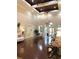 Spacious clubhouse lobby with hardwood floors and chandelier at 6707 Stone River Rd # 203, Bradenton, FL 34203