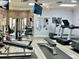 Modern fitness center with treadmills and weight machines at 6707 Stone River Rd # 203, Bradenton, FL 34203