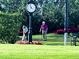 Couple putting on a well-maintained golf course at 6707 Stone River Rd # 203, Bradenton, FL 34203