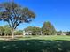 Homes overlook the manicured golf course at 6707 Stone River Rd # 203, Bradenton, FL 34203
