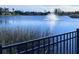 Serene lake view with fountain and lush vegetation at 6707 Stone River Rd # 203, Bradenton, FL 34203