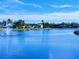 Scenic lakefront property with fountain and lush landscaping at 6707 Stone River Rd # 203, Bradenton, FL 34203