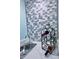 Stylish wet bar featuring hexagon tile and wine rack at 6707 Stone River Rd # 203, Bradenton, FL 34203