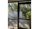 Screened patio with access to a private backyard at 7030 W Country Club N Dr # 128, Sarasota, FL 34243