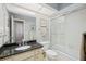 Bathroom with granite countertop and tub shower at 7361 Oak Moss Dr # 34, Sarasota, FL 34241