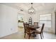 Cozy dining area with round table and chairs, near kitchen at 7361 Oak Moss Dr # 34, Sarasota, FL 34241