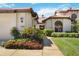 Home's exterior showcasing walkway and landscaping at 7361 Oak Moss Dr # 34, Sarasota, FL 34241