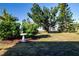 Landscaped backyard with bird bath and various plants at 804 Buttonwood Dr, Bradenton, FL 34208