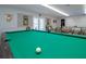 Community billiard table in a well-lit room at 804 Buttonwood Dr, Bradenton, FL 34208