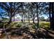 Relaxing shaded picnic area with tables and benches at 804 Buttonwood Dr, Bradenton, FL 34208