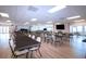 Spacious community room with tables and chairs, perfect for gatherings at 804 Buttonwood Dr, Bradenton, FL 34208