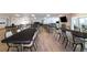 Large community room with tables and chairs at 804 Buttonwood Dr, Bradenton, FL 34208