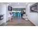 Community room with seating and large windows at 804 Buttonwood Dr, Bradenton, FL 34208