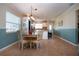 Bright dining area with wood table and chairs near kitchen at 804 Buttonwood Dr, Bradenton, FL 34208