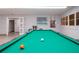 Community room with pool table and seating area at 804 Buttonwood Dr, Bradenton, FL 34208