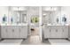 Double vanity bathroom with ample counter space and a view into the bedroom at 8725 Sundance Loop, Sarasota, FL 34238