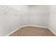 Large walk-in closet with wire shelving, providing ample storage space at 8725 Sundance Loop, Sarasota, FL 34238