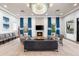 Elegant community room with fireplace and comfortable seating at 8725 Sundance Loop, Sarasota, FL 34238