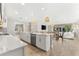Open concept kitchen flows into living area at 8725 Sundance Loop, Sarasota, FL 34238