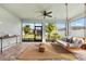 Screened lanai with comfortable swing bed, perfect for relaxing outdoors at 8725 Sundance Loop, Sarasota, FL 34238