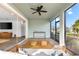 Bright screened porch features a swing and opens to the living area at 8725 Sundance Loop, Sarasota, FL 34238