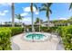 Relax in this community spa with comfortable seating at 8725 Sundance Loop, Sarasota, FL 34238