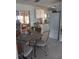 Kitchen features a dining area and view into a sunroom at 1002 Oakleaf Blvd, Bradenton, FL 34208
