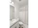 Clean bathroom with a shower/tub combo and white vanity at 10435 Ladybug Cv, Parrish, FL 34219