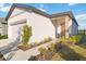 One-story home with a front entry and garage at 10435 Ladybug Cv, Parrish, FL 34219