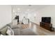 Modern kitchen with island and stainless steel appliances at 10435 Ladybug Cv, Parrish, FL 34219