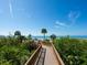 Convenient boardwalk leads to the pristine beach at 1211 Gulf Of Mexico Dr # 301, Longboat Key, FL 34228
