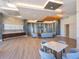 Stylish common area with seating and a large TV at 1211 Gulf Of Mexico Dr # 301, Longboat Key, FL 34228