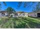 Spacious backyard with screened patio and lush lawn at 12328 Wood Sage Ter, Lakewood Ranch, FL 34202